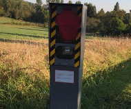 Red spraypainted speed camera