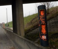 French speed camera spraypainted orange