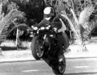 Wheelie motorcyclist