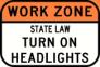Work zone headlight sign